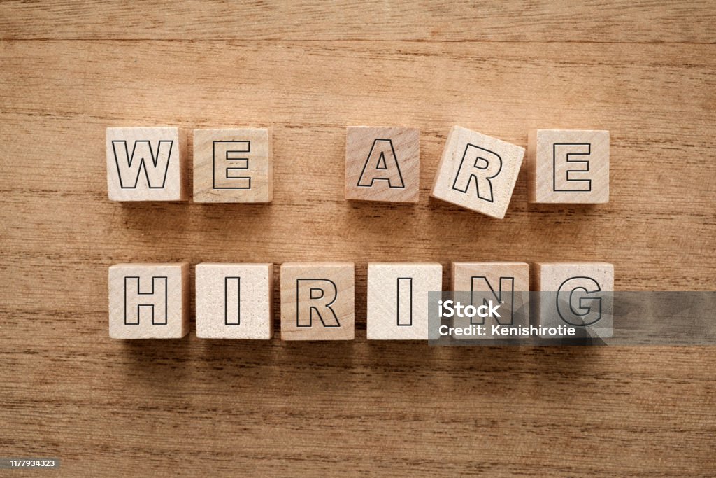 We Are Hiring Word On Wooden Cube Blocks